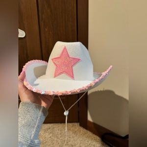 White and pink cowgirl hat